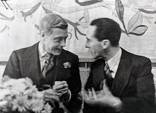 The Duke of Windsor chats with Hitler’s propaganda minister, Joseph Goebbels at a dinner in Berlin. Photo by anonymous (c. 10 October 1937). ©️Popperfoto/Getty Images. 