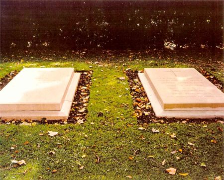 The graves of the Duke (left) and Duchess (right) of Windsor are located on the grounds of Frogmore House in the Frogmore Royal Burial Ground. Photo by John Wieneman (26 August 1992). ©️Graves of Duke and Duchess of Windsor by John Wieneman. PD-CCA-Share Alike 2.0 Generic. Wikimedia Commons.
