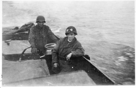 Jack Caminer (foreground) crossing the Rhine River. He participated in the liberation of Ohrdruf and was a Ritchie Boy. Photo by anonymous (29 March 1945). Courtesy of Jack Caminer. Photograph no. 45997. United States Holocaust Memorial Museum.