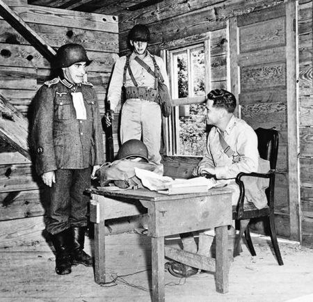 Nazi soldier interrogation training in Camp Ritchie. The “German” soldier is likely an American dressed as a POW. Photo by anonymous (date unknown). National Archives NARA.