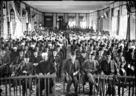 An Arab protest gathering in session at the Rawdat el Maaref hall. Photo by anonymous (c. 1929). Library of Congress/Matson Collection. PD-No restrictions. Wikimedia Commons. 