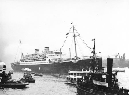 M.S. St. Louis surrounded by smaller vessels in the port of Hamburg, Germany. Photo by anonymous (date unknown). U.S. Holocaust Memorial Museum. PD-U.S. Government. Wikimedia Commons.