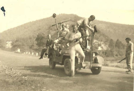 Howard Snyder jumping off a jeep while fighting with the maquis. Photo by anonymous (c. 1944). Courtesy of Steve Snyder. https://stevesnyderauthor.com. 