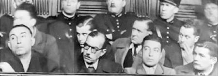 The December 1944 trial of the Bonny-Lafont gang. From left to right: Henri Lafont, Pierre Bonny, and Lafont’s nephew, Paul Clavie. Photo by anonymous (c. December 1944).