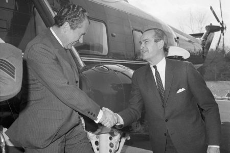 President Richard M. Nixon shakes hands with CIA Director Richard Helms. Photo by anonymous (7 March 1969). Bettmann Archive/Getty Images.