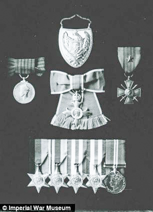Christine’s war medals included the OBE (center), the Croix de Guerre (center right), the George Medal (center left), and the Polish Patriot Shielf (top). Photo by anonymous (date unknown). ©️Imperial War Museum.