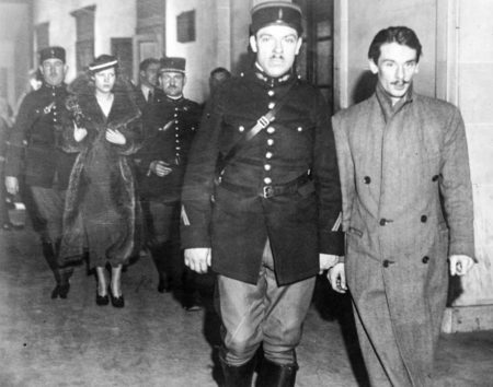 John Amery (right) arriving at the Palais de Justice concerning the passing of a forged check. Photo by anonymous (c. 1936).