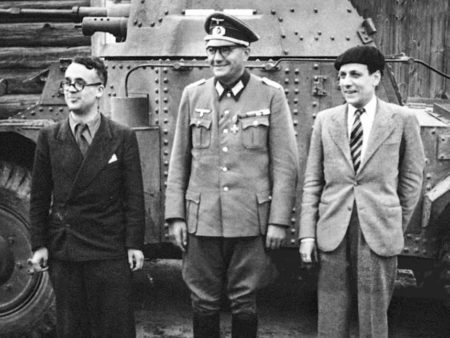 French writer and journalist, Robert Brasillach (left; executed as a collaborator) and Jacques Doriot (center; killed by Allied aircraft). Photo by anonymous (c. 1943). PD-Expired copyright. Wikimedia Commons.