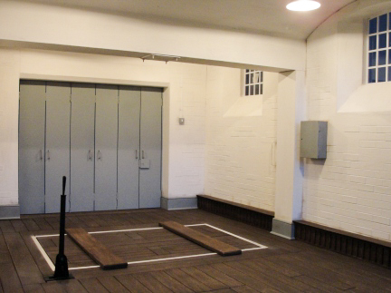 Interior of the execution chamber and gallows at Wandsworth Prison. John Amery was hanged in this room on 19 December 1945. Photo by anonymous (date unknown). 