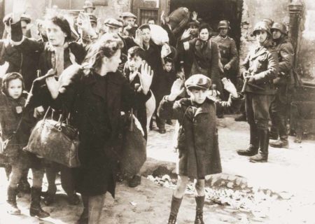 A Jewish boy surrenders during the Warsaw Ghetto uprising. Josef Blösche is the SS man with the gun. 