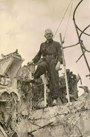 Hilmar Dierks on a destroyed warship of the Royal Navy in La Panne. Photo by anonymous (c. May 1940).
