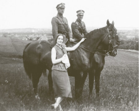 Vera von Schalburg (standing) next to her brother sitting on his horse. Photo by anonymous (date unknown). Bogmagasinet.