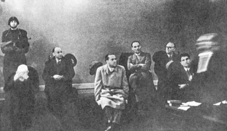 The six men on trial for treason. Left to right: Emilio De Bono, Carlo Pareschi, Gian Galeazzo Ciano, Luciano Gottardi, Giovanni Marinelli, and Tullio Cianetti. One of the men, Cianetti, received a 30-year sentence while the others were condemned to death. Photo by anonymous (c. January 1944). PD-Expired copyright. Wikimedia Commons. 