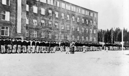 Grini was a Nazi concentration camp located outside Oslo, Norway. Photo by anonymous (c. 1941). Royal Norwegian Information Service. PD-U.S. Government. Wikimedia Commons.