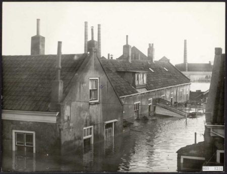 Aftermath of the Great Flood with houses underwater in Slikkerveer, South Holland.
