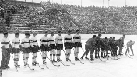 Germany (left) line up to face the United States (right), going through their pre-match battle cry, in their opening match of the 1936 Olympics