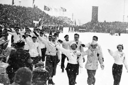 Canadian Olympic team passing by the reviewing stand during the opening ceremonies for the 1936 Olympics.