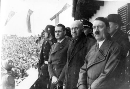 Adolf Hitler (right) and Rudolf Hess (third from the right) at the 1936 Winter Olympics.