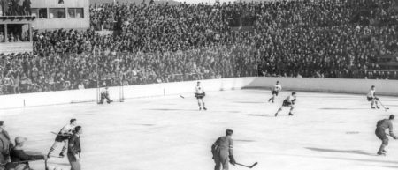 1936 Winter Olympic hockey game with Canada (white jerseys) playing the United States (dark jerseys).