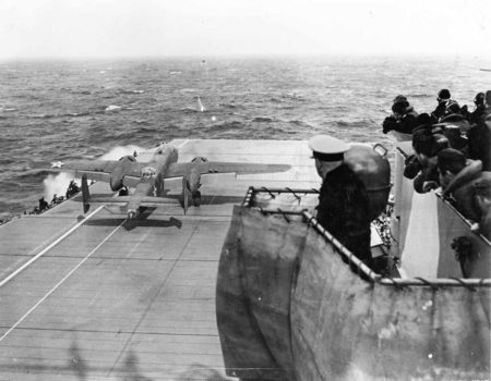 Lt. Col. James Doolittle performs a full-throttle takeoff from the USS Hornet 650 miles from Japan.