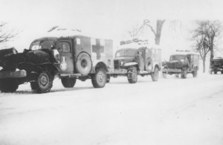 Ambulances in snow driving through Alsace.