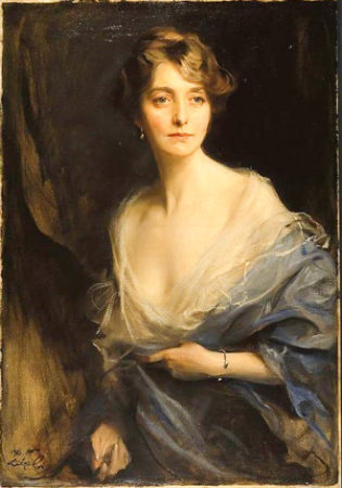 Sydney Bowles, wife of David Freeman-Mitford, 2nd Lord Redesdale. Painting by Philip de László (c. 1916). Chatsworth House. PD-Author’s life plus 80 years or fewer. Wikimedia Commons.