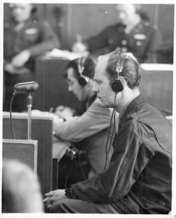 Dr. Karl Kahr testifying on the stand at the Trial of the SS Economic and Administrative Main Office (Case 4 of the twelve follow-up trials). He is describing the conditions at the concentration camps.