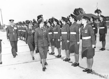HRH The Duchess of Glouster inspects the WRAF at Gatow Airport. Photo by P.M. Parsons, F/Lt, WRAF, Ret. (c. 1948). Imperial War Museum. PD-Photograph taken prior to 1 June 1957. Wikimedia Commons.