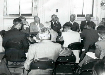 Meeting of the President’s Advisory Committee on a National Highway System (“The Clay Committee”). Photo by anonymous (c. October 1954). National Archives and the Dwight D. Eisenhower Presidential Library, Museum & Boyhood Home. PD-U.S. Government.