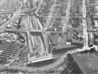 Aerial view of Interstate 280 construction through Balboa Park, San Diego. Photo by anonymous (c. 1964). California Highways and Public Works. PD-State of California. Wikimedia Commons.