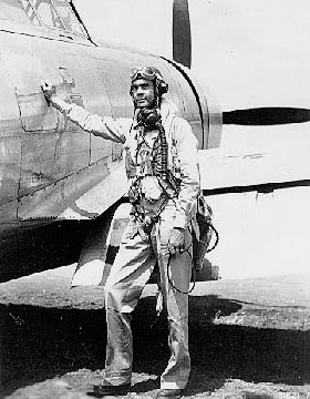 Col. Benjamin O. Davis Jr in front of his P51C in Sicily, Italy. Photo by anonymous (c. 1944). PD-U.S. government. Wikimedia Commons.