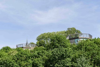 View of two turrets of the former Flakturm III located in Humboldthain Park. Photo by Sandy Ross (c. May 2023).
