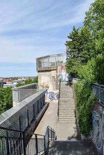 Atop former Flakturm III with a view to one of the turrets where the anti-aircraft guns were mounted. Photo by Sandy Ross (c. May 2023).