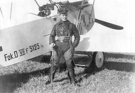 Oberleutnant Hermann Göring, commander of Jagdgeschwader I, alongside his white Fokker D VII. Photo by anonymous (c. 1918). PD-Expired copyright. Wikimedia Commons.