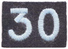 World War II shoulder patch insignia of 30 Assault Unit, or 30 AU. No other unit insignias were worn due to the high security nature of the intelligence unit. Photo by Lanceng156 (28 January 2012). PD-CCA-Share Alike 3.0 Unported. Wikimedia Commons.