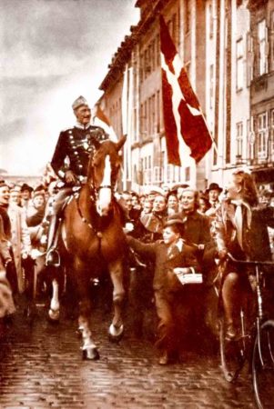 King Christian X riding through Copenhagen on his 70th birthday. Photo by anonymous (26 September 1940). PD-Public domain in Denmark. Wikimedia Commons.