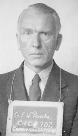 Mug shot of former head of Gestapo in Denmark, Günther Pancke. Photo by anonymous (17 August 1945). National Museum of Denmark. Courtesy of Civilian Interrogation Center-British Military Mission Denmark. PD-Expired copyright. Wikimedia Commons.