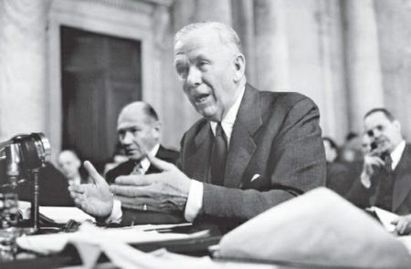 Secretary of State Gen. George C. Marshall speaking to the House Appropriations Committee regarding the Marshall Plan. Photo by Winston Groom (15 January 1948). U.S. National Archives. PD-CCA-Share Alike 4.0 International. Wikimedia Commons.