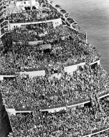 RMS Queen Mary bringing American troops home from Europe. Photo by anonymous (c. 1945). New York Historical Society. Rare Historical Photos. https://rarehistoricalphotos.com/crowded-ship-bringing-american-troops-1945/