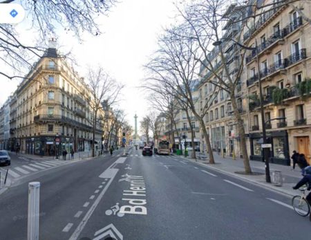 Contemporary view of Boulevard Henri IV looking toward the Place de la Bastille and the commemorative pillar, Colonne de Juillet, that stands in the middle of the roundabout. Photo by Google Maps (date unknown).