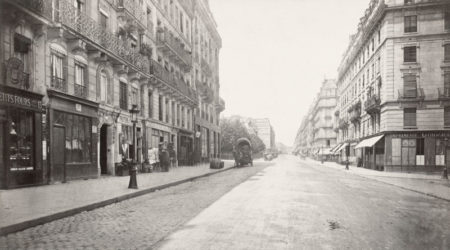 View of rue des Ecoles toward Rue Monge from the east. On the left behind the horse and wagon is the square Monge (now known as square Paul-Langevin). Photo by Charles Marville (c. 1853-70). State Library Victoria. PD-Author’s life plus 100 years or fewer. Wikimedia Commons.
