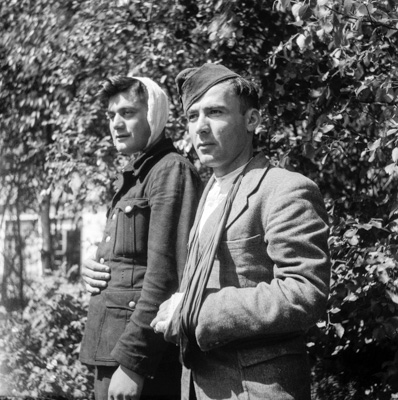 Two German soldiers after the battle with the Georgian Legion on Texel. Photo by J.A. van der Vlis/Anefo (c. 1945). Dutch National Archives. PD-CCA-Share Alike 3.0 Netherlands. Wikimedia Commons.