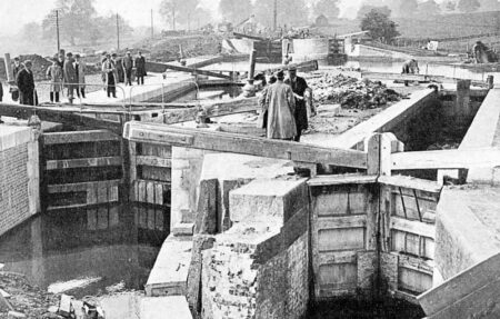 Old (right) and new (left) locks on the Grand Union Canal. Photo by anonymous (c. March 1940). “Far From Idle: The Women Canal Workers of the Second World War” (author: Rose Staveley-Wadham), The British Newspaper Archive, 4 February 2021. Originally published by The Sphere, 10 November 1934. https://blog.britishnewspaperarchive.co.uk.