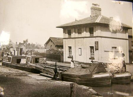 Two narrow canal boats side-by-side. Photo by anonymous (date unknown). ©️Molly Traills Archive. Posted by Black Ibis c. September 2013. https://www.canalworld.net