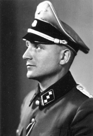 Klaus Barbie in his SS uniform. Photo by anonymous (date unknown). PD-Expired copyright. Wikimedia Commons.