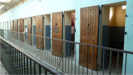 Row of cells in Montluc Prison. Photo by anonymous (c. April 2013). France info: Culture, France Télévisions. https://www.francetvinfor.fr/culture/patrimoine/traces-d-histoire-dans-les-cellules-de-la-prison-montluc-a-lyon_3307611.html