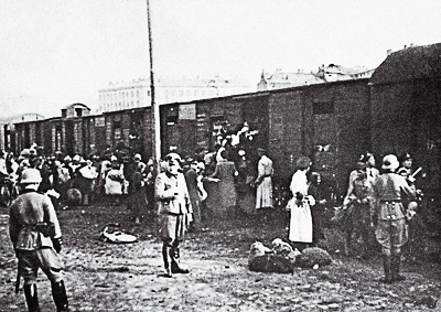 Jews being loaded into the cattle cars at the Umschlagplatz in Warsaw. Photo by anonymous (c. 1942-43). PD-Poland Public Domain. Wikimedia Commons.