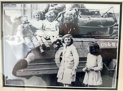 The girl sitting on the tank to the right is Carl’s future wife. Photo by anonymous (date unknown). Courtesy of Carl S.