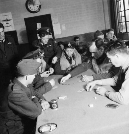 American volunteer pilots of No. 121 Eagle Squadron playing poker in the dispersal hut at RAF Rochford in Essex. Photo by anonymous (c. August 1942).