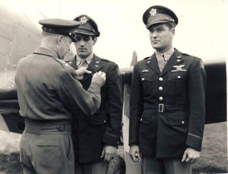 Gen. Dwight D. Eisenhower awarding the Distinguished Service Cross to Dominic (“Don”) Salvatore Gentile (left) and Donald Blakeslee (right).
